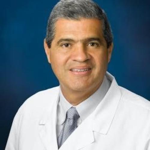 Dr. Carlos Tandron headshot